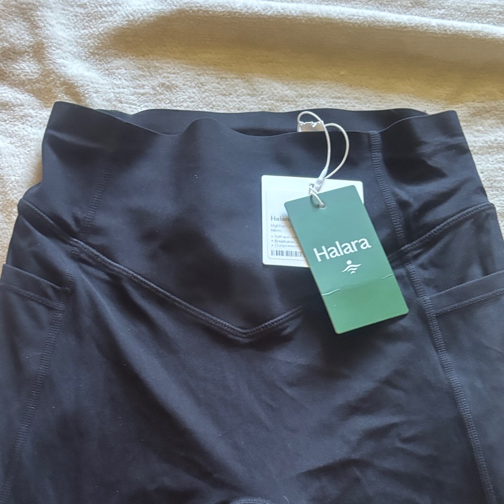 HALARA Sleek Black High-Waisted Butt Lifting Leggings with small pockets on side